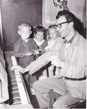 Dave with Tod Keeler, Stephanie Peterson and Linda Anderson of the Tiny Tots Nursery School,1955. 